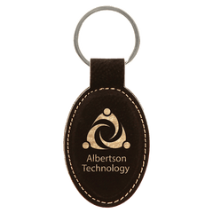 Black/Gold 3" x 1 3/4" Laserable Leatherette Oval Keychain